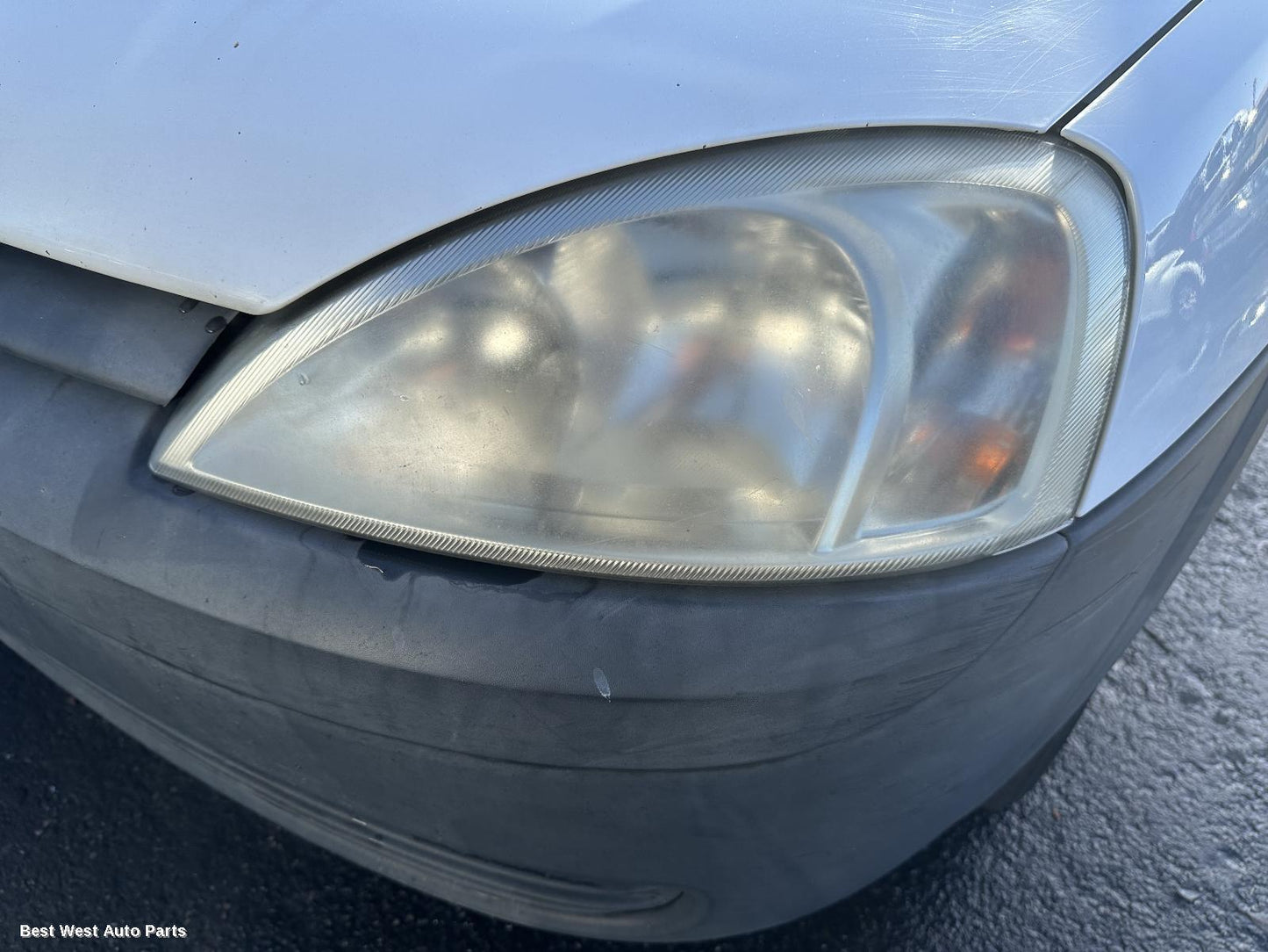 2011 HOLDEN BARINA Left Headlamp
