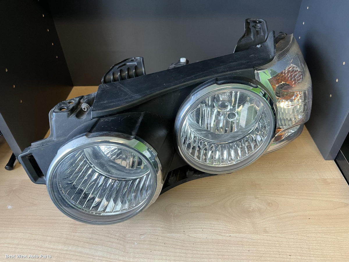 2011 HOLDEN BARINA Left Headlamp