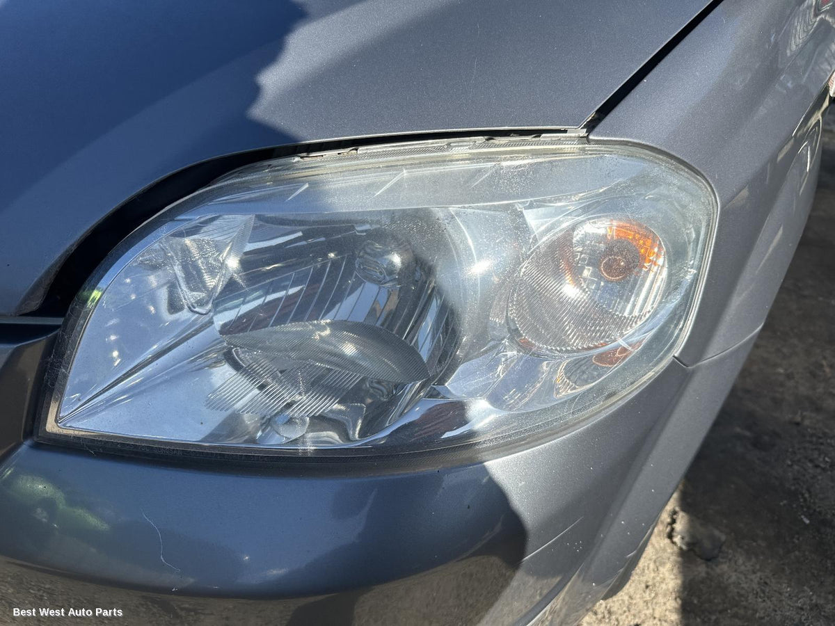 2010 HOLDEN BARINA Right Headlamp