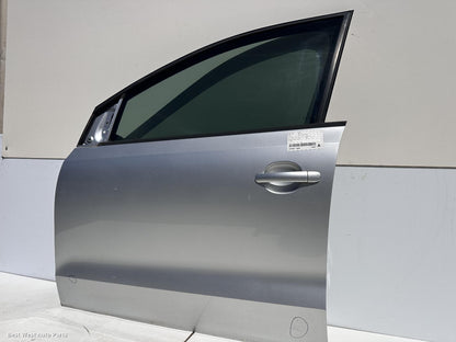 2011 VOLKSWAGEN POLO Left Front Door
